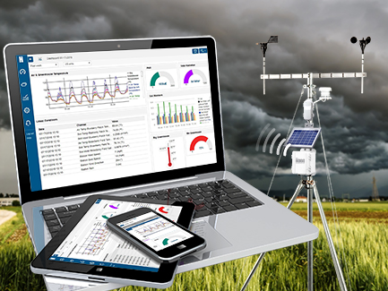 HOBO software shows laptop ipad and mobile phone with weather station in field