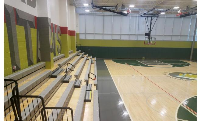 High school gymnasium showing hard wood floor 