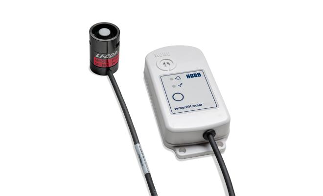 PAR sensor attached to a wireless temp/RH data logger by a cable