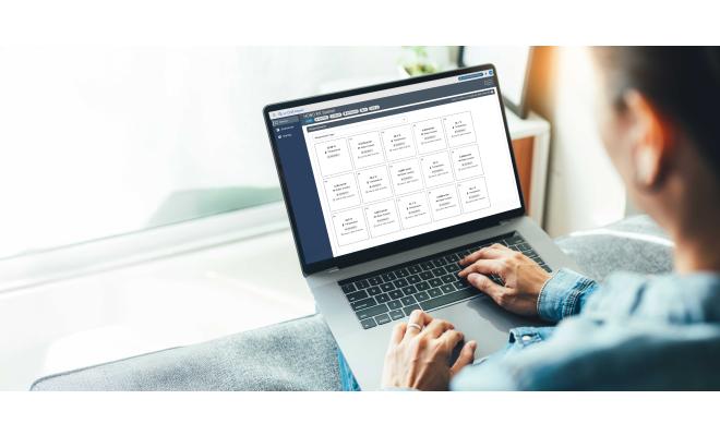 Woman looking at LICOR Cloud software data dashboard