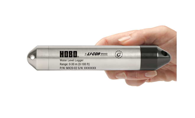 hand holding the MX20 data logger
