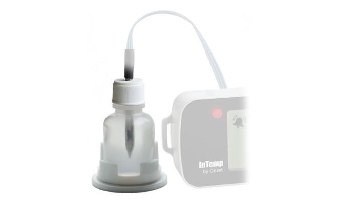 Glycol bottle with a probe stuck in with a faded logger next to it to illustrate its usage