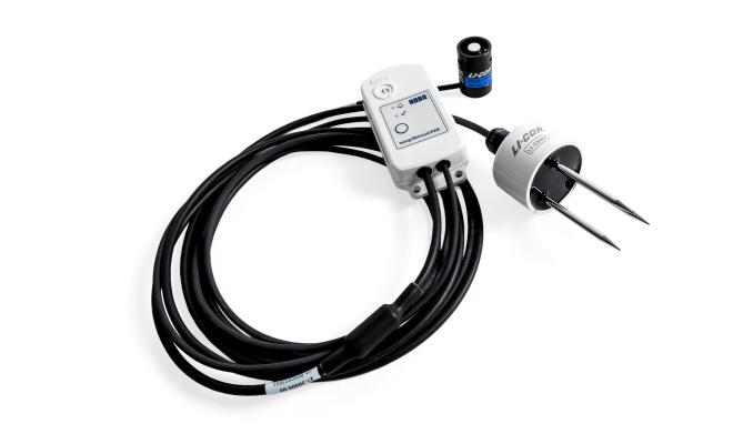 MX2310 studio photo - a small white device connected to 2 senor devices, connected by a long black cable.
