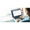 Woman looking at LICOR Cloud software data dashboard