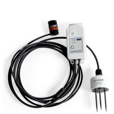 MX2311 studio photo - a small white device connected to 2 senor devices, connected by a long black cable.