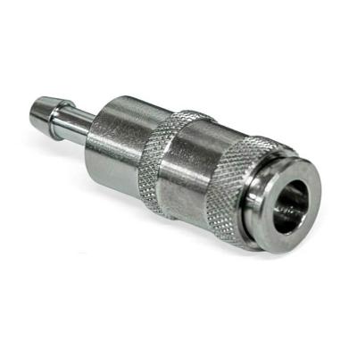 A small silver metal connector with an audio jack sized hole on one side and a barbed nipple on the other side.