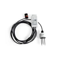 MX2311 studio photo - a small white device connected to 2 senor devices, connected by a long black cable.