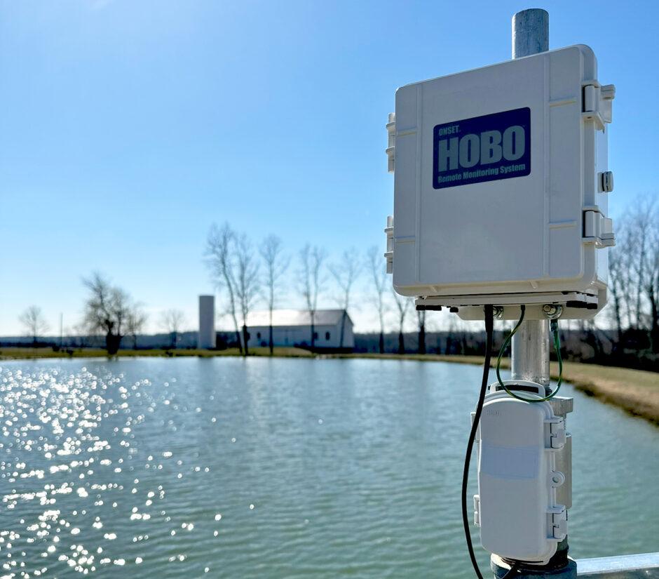 HOBO remote monitoring station at Fondriest test farm by pond 